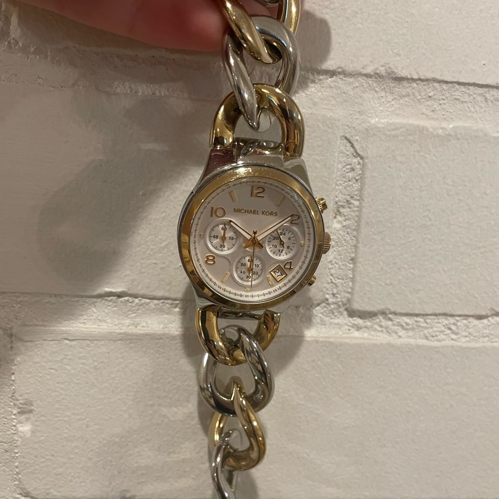 Michael Kors gold and silver watch.